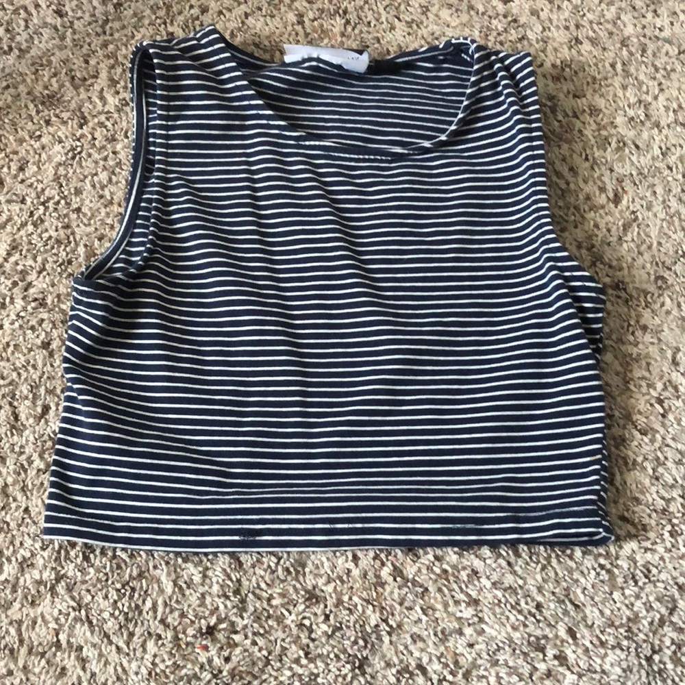 color is a navy blue with white stripes, cropped and breathable, 100% cotton